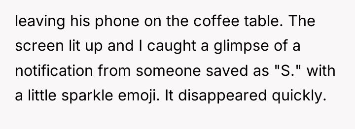 leaving his phone on the coffee table. The screen lit...
