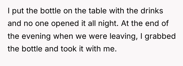 I put the bottle on the table with the drinks...