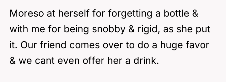 Moreso at herself for forgetting a bottle & with me...