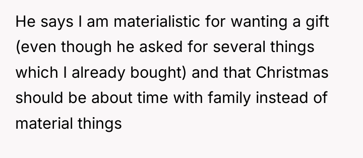 He says I am materialistic for wanting a gift (even...
