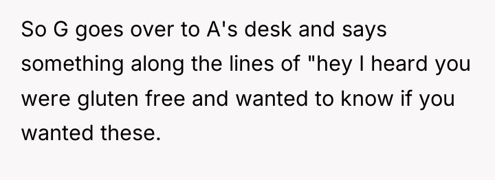 So G goes over to A's desk and says something...