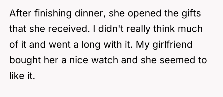 After finishing dinner, she opened the gifts that she received....