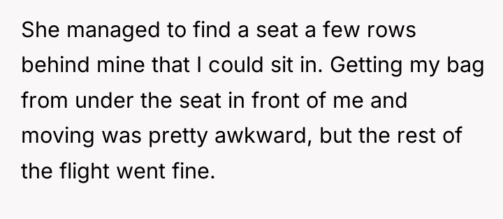 She managed to find a seat a few rows behind...