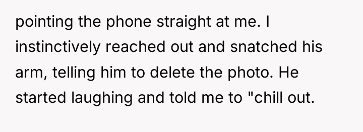 pointing the phone straight at me. I instinctively reached out...