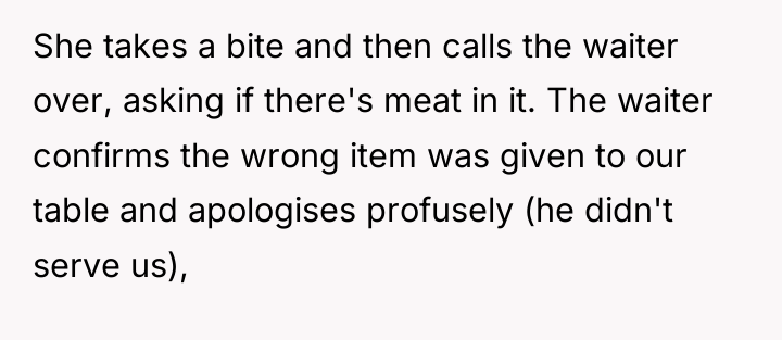 She takes a bite and then calls the waiter over,...