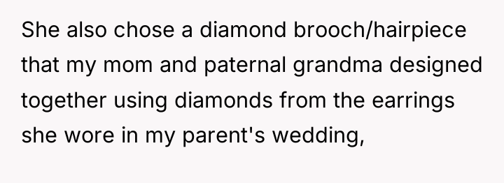 She also chose a diamond brooch/hairpiece that my mom and...