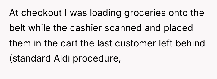 At checkout I was loading groceries onto the belt while...
