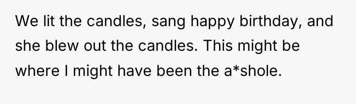 We lit the candles, sang happy birthday, and she blew...