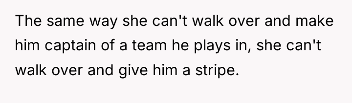 The same way she can't walk over and make him...