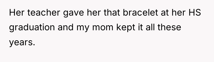 Her teacher gave her that bracelet at her HS graduation...