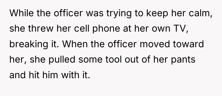 While the officer was trying to keep her calm, she...