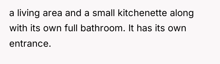 a living area and a small kitchenette along with its...