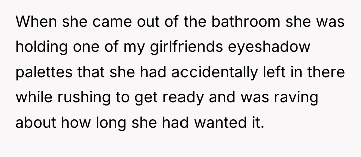 When she came out of the bathroom she was holding...
