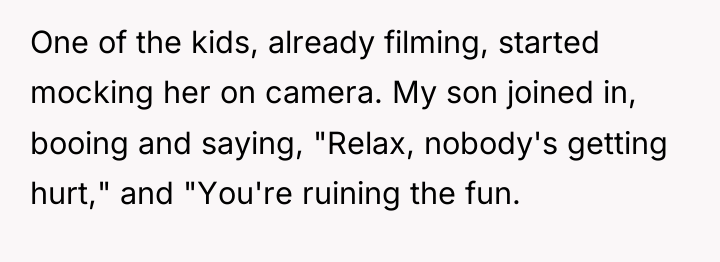 One of the kids, already filming, started mocking her on...