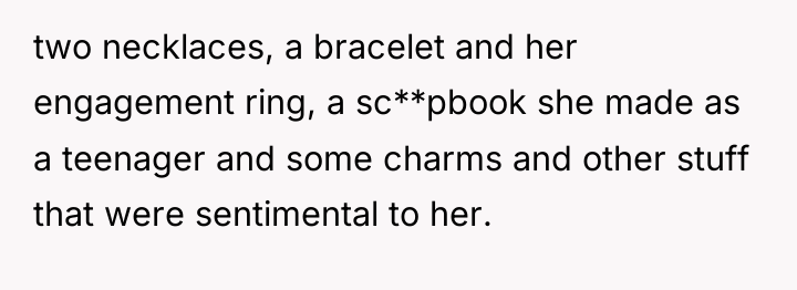 two necklaces, a bracelet and her engagement ring, a sc**pbook...