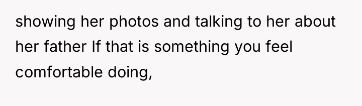 showing her photos and talking to her about her father...