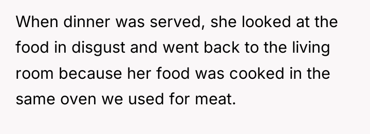 When dinner was served, she looked at the food in...