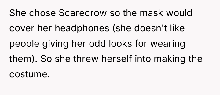 She chose Scarecrow so the mask would cover her headphones...