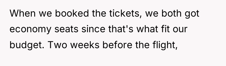 When we booked the tickets, we both got economy seats...