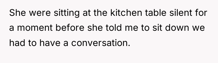 She were sitting at the kitchen table silent for a...