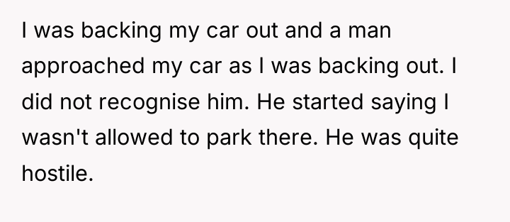 I was backing my car out and a man approached...