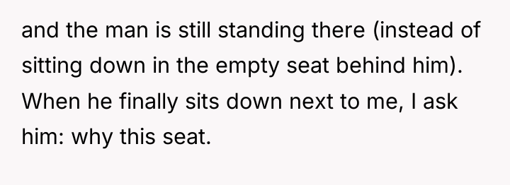 and the man is still standing there (instead of sitting...