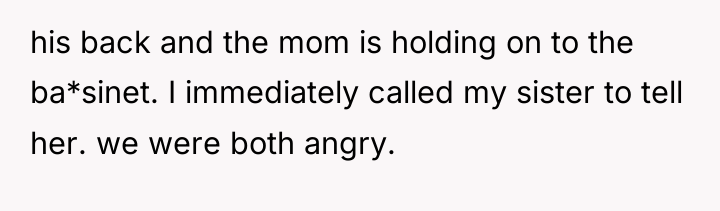 his back and the mom is holding on to the...
