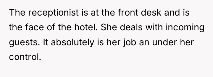 The receptionist is at the front desk and is the...