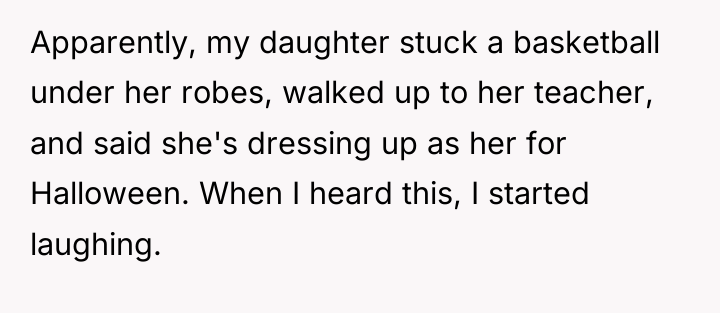 Apparently, my daughter stuck a basketball under her robes, walked...