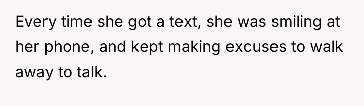 Every time she got a text, she was smiling at...