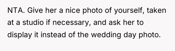 NTA. Give her a nice photo of yourself, taken at...