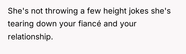 She's not throwing a few height jokes she's tearing down...