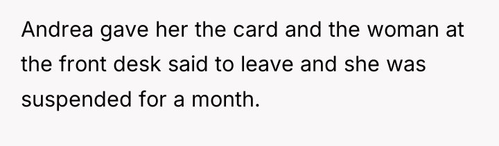Andrea gave her the card and the woman at the...