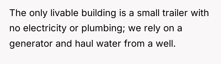 The only livable building is a small trailer with no...
