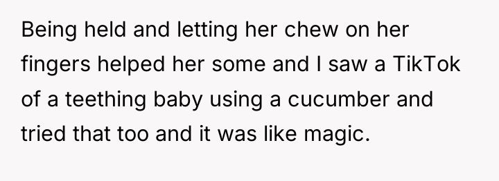 Being held and letting her chew on her fingers helped...