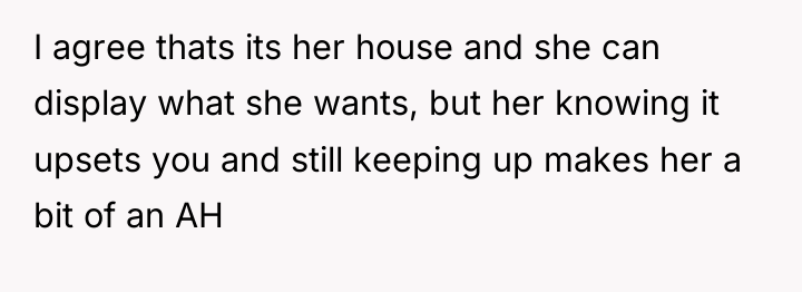 I agree thats its her house and she can display...