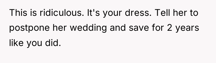 This is ridiculous. It's your dress. Tell her to postpone...