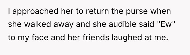 I approached her to return the purse when she walked...