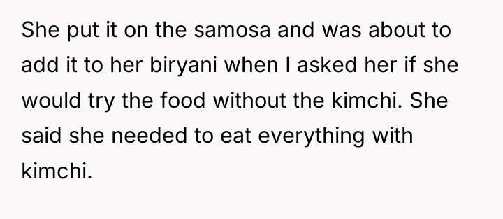 She put it on the samosa and was about to...