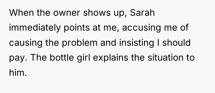 When the owner shows up, Sarah immediately points at me,...